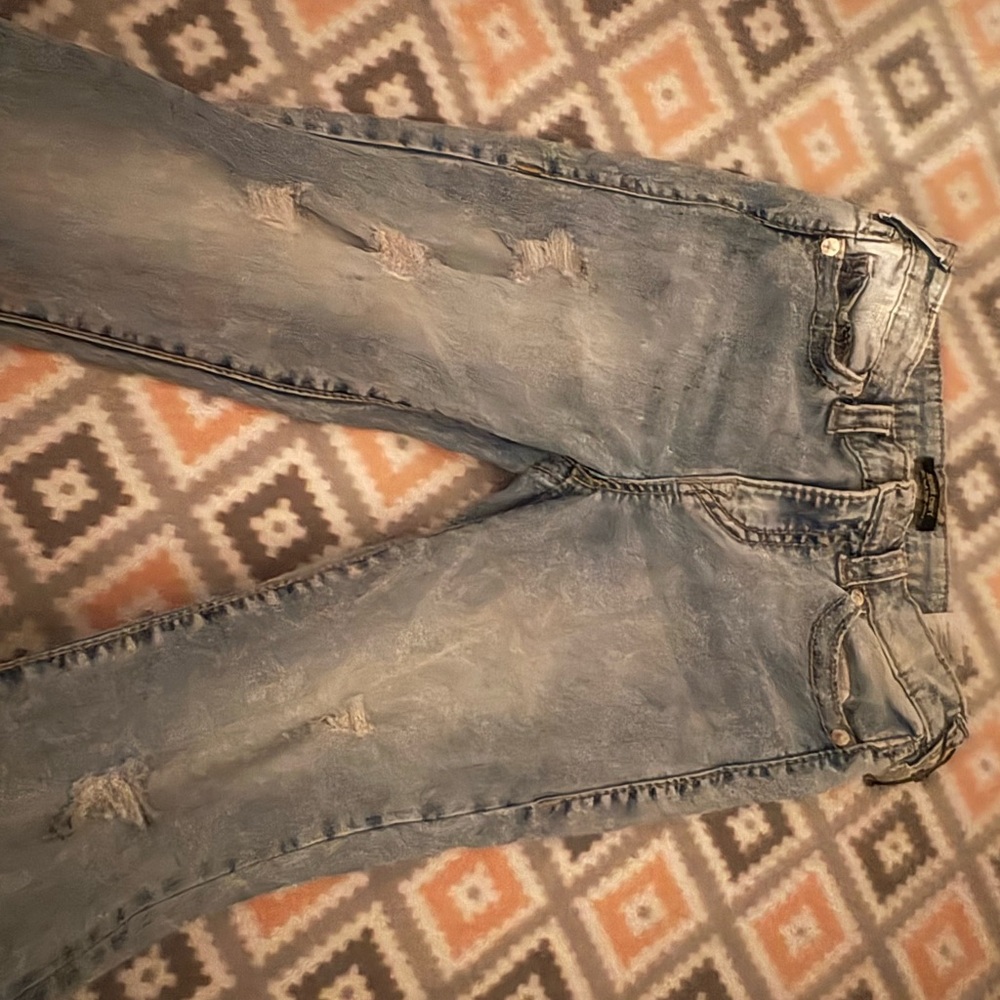 Distressed Blue Jeans